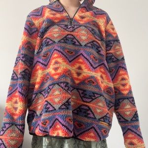 Simply southern pull over. Mainly orange and purple with pop of other colors :)